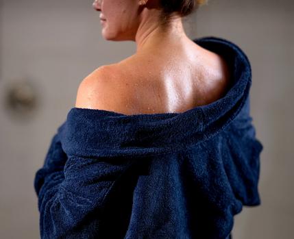 Harbor Resort Bathrobe on woman in bathroom