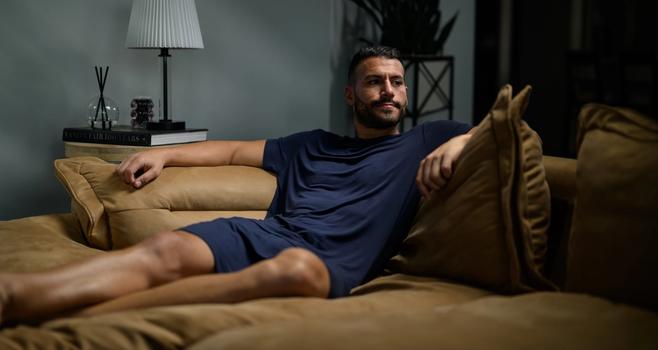 Man staying cool with Modal Pajamas in storm