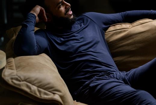 Man staying cool with Modal Pajamas in storm
