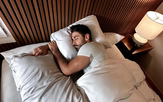 Man Sleeping on Stone Bamboo Sheets and Pillowcase