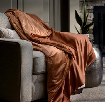 Clay weighted blanket on accent chair