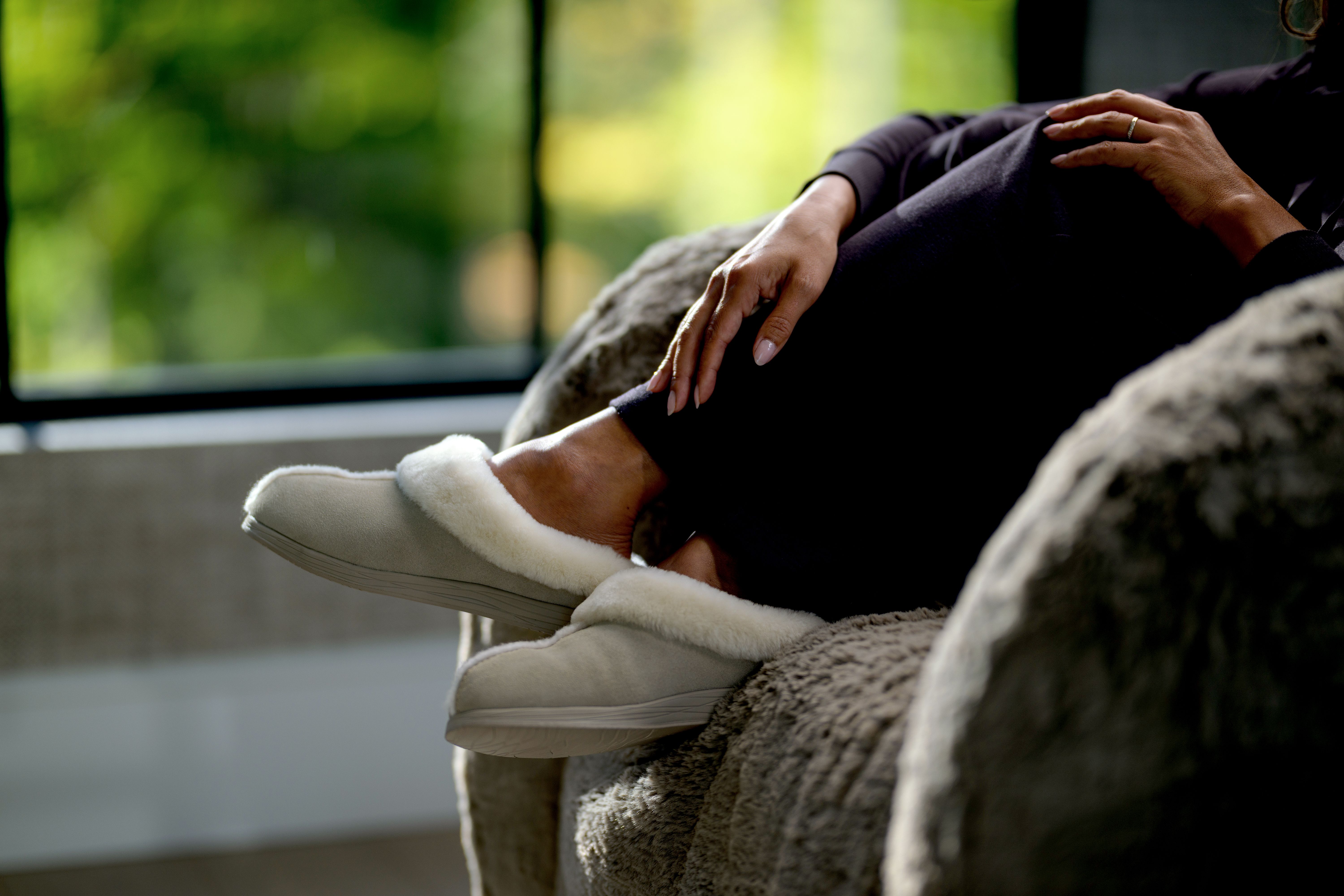 Lounging in the cozy Birch Signature Slippers
