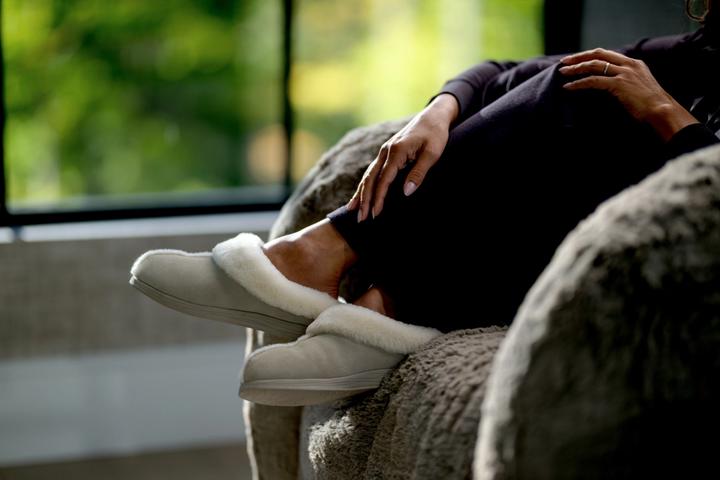 Lounging in the cozy Birch Signature Slippers