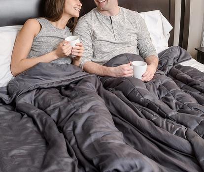 Cuddling under the cooling weighted blanket in grey