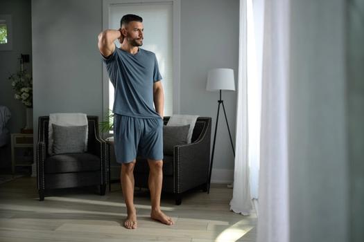 Man staying cool with Modal Pajamas in dusk