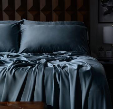 Luxury sheets in ocean on a bed