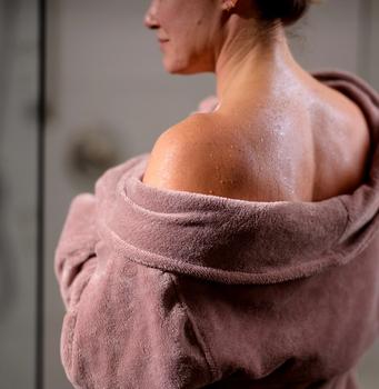 Lily Resort Bathrobe on woman in bathroom