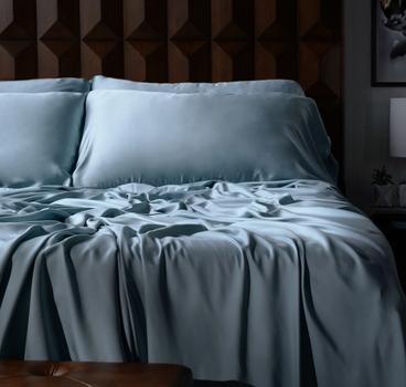 Luxury sheets in surf on a bed