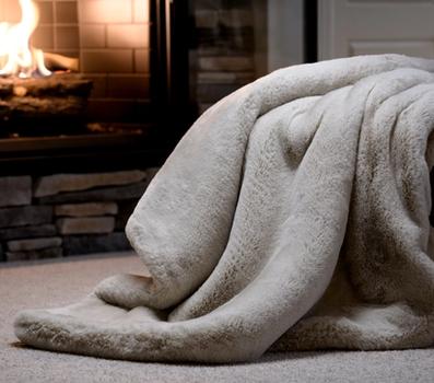 The luxurious and cozy Faux Fur Blanket in Almond
