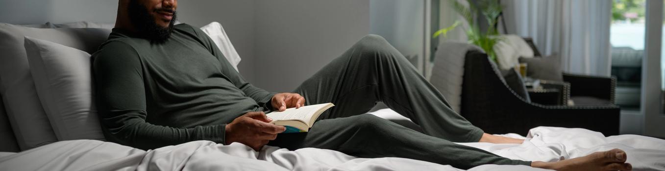 Man staying cool with Modal Pajamas in evergreen