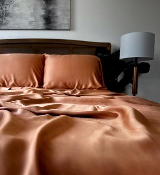 Terracotta Luxury Bamboo Sheet Set on bed