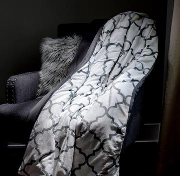 Lattice weighted blanket on accent chair