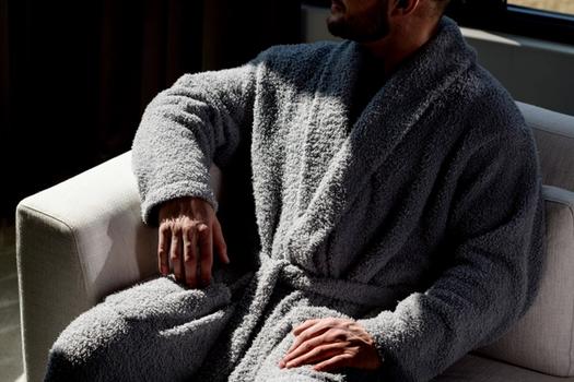 Man wearing the cozy Ultra Plush Robe in grey