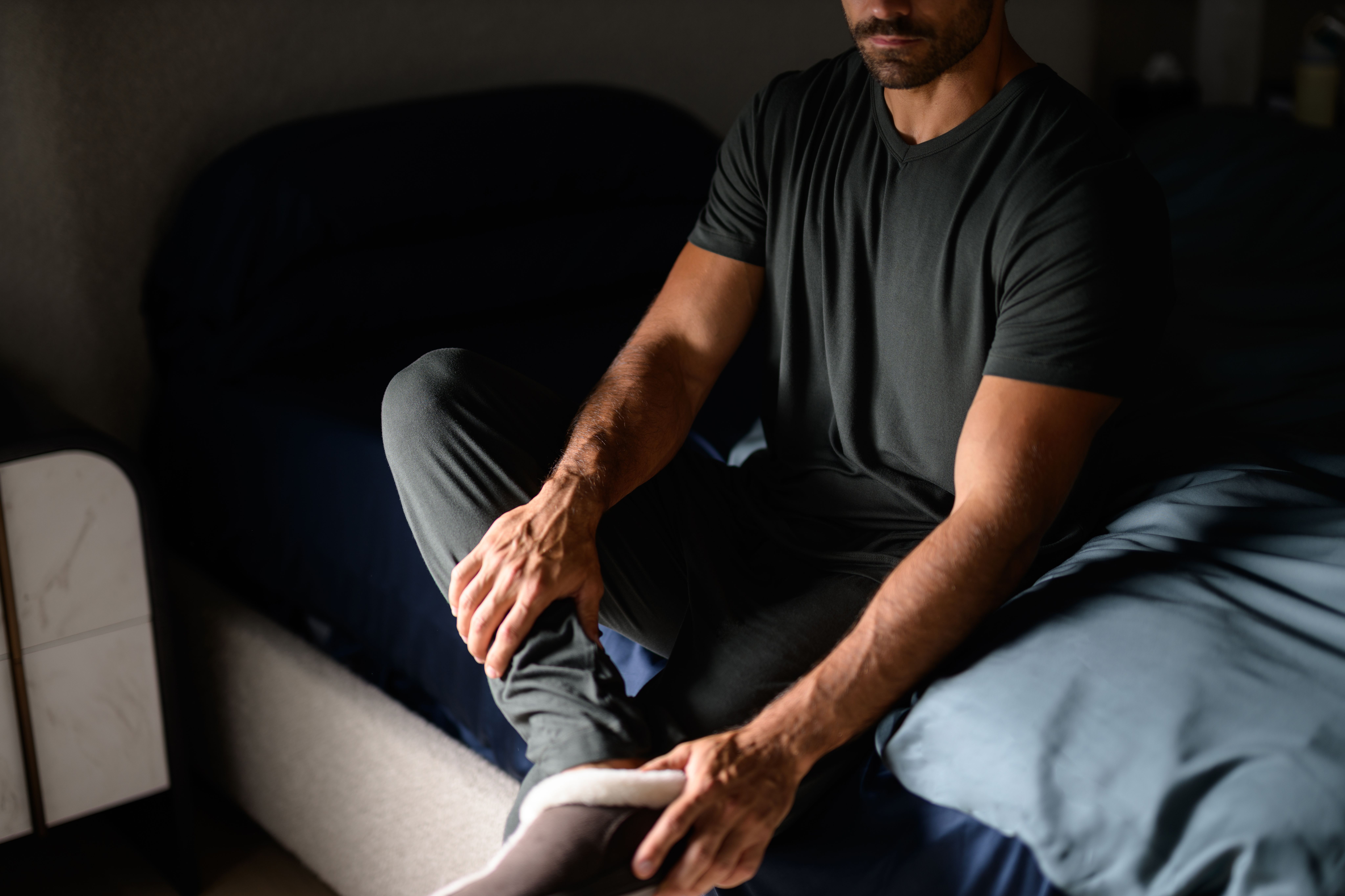 Man feeling comfortable wearing Modal Sleepwear in Evergreen