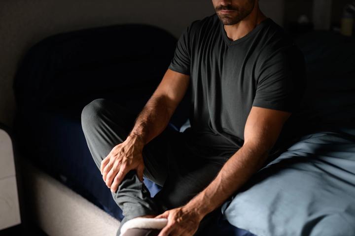 Man feeling comfortable wearing Modal Sleepwear in Evergreen