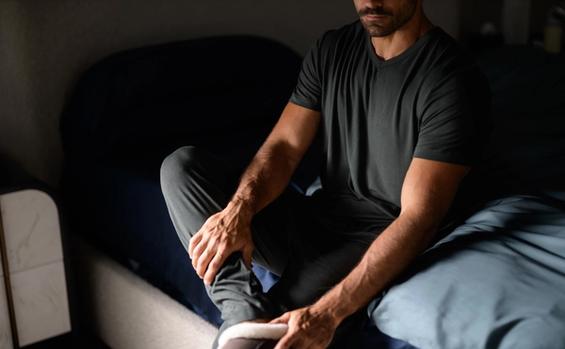 Man feeling comfortable wearing Modal Sleepwear in Evergreen