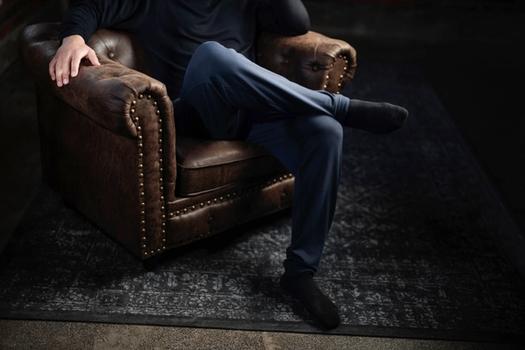 Man wearing the cozy Essential Jogger in storm