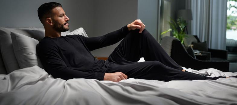 Man staying cool with Modal Pajamas in Onyx