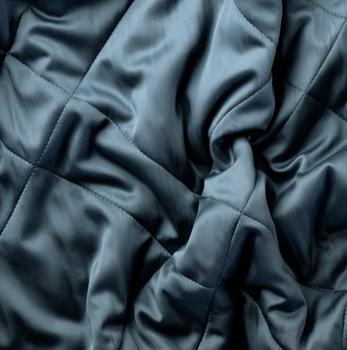 Luxury bamboo blanket, close-up detail of the fabric in the color ocean