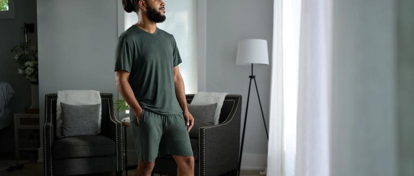 Man staying cool with Modal Pajamas in evergreen