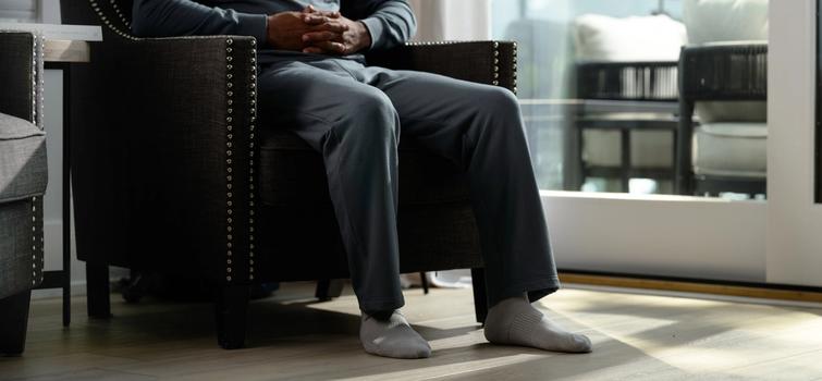 Man wearing the cozy Essential Crew & Relaxed Pant in spruce