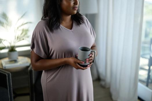 Woman staying cool in Modal Pajamas in lilac