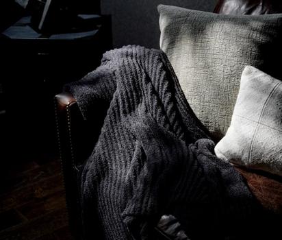 Charcoal Ultra Plush Throw on a sofa