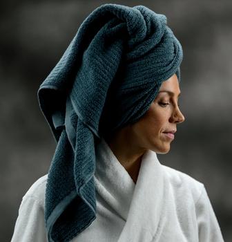 Staying dry with Plush Performance Towels in the color Ocean