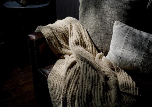Dune Ultra Plush Throw on a sofa
