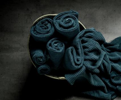 Surf Plush Performance Towels in a basket