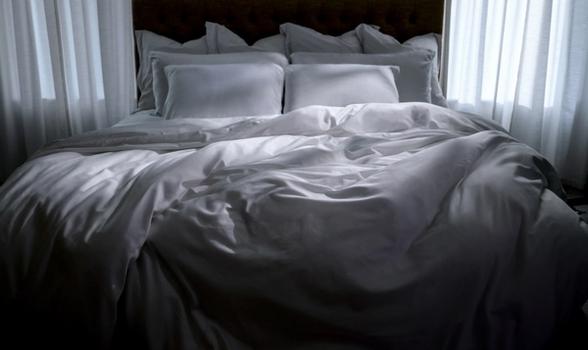 White Duvet Cover on Bed