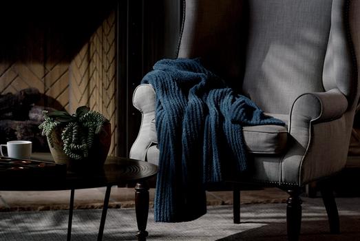 Ocean Ultra Plush Throw on a chair
