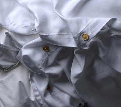 Close up of a bamboo duvet cover with extra ties in the color white