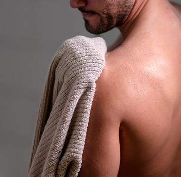 Staying dry with Plush Performance Towels in the color Oyster