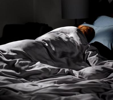 Sleeping under the cooling bamboo duvet covet in stone