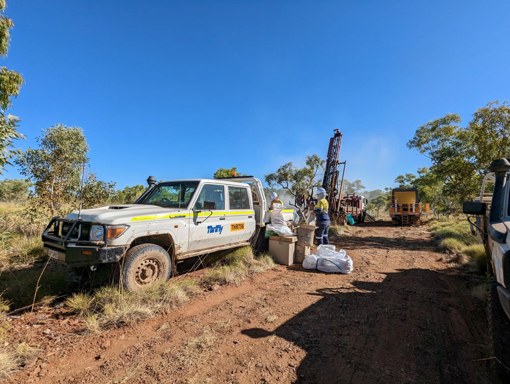 4x4 trucks on a gravel trail in the outback