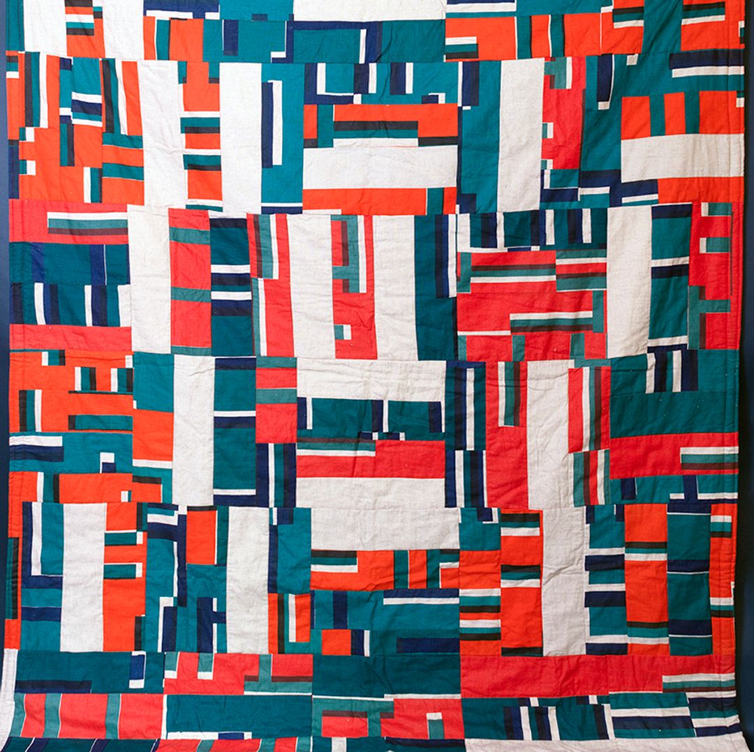 bold wallhanging with screen printed blocks of colour patchworked together to form a large scale abstract artwork.