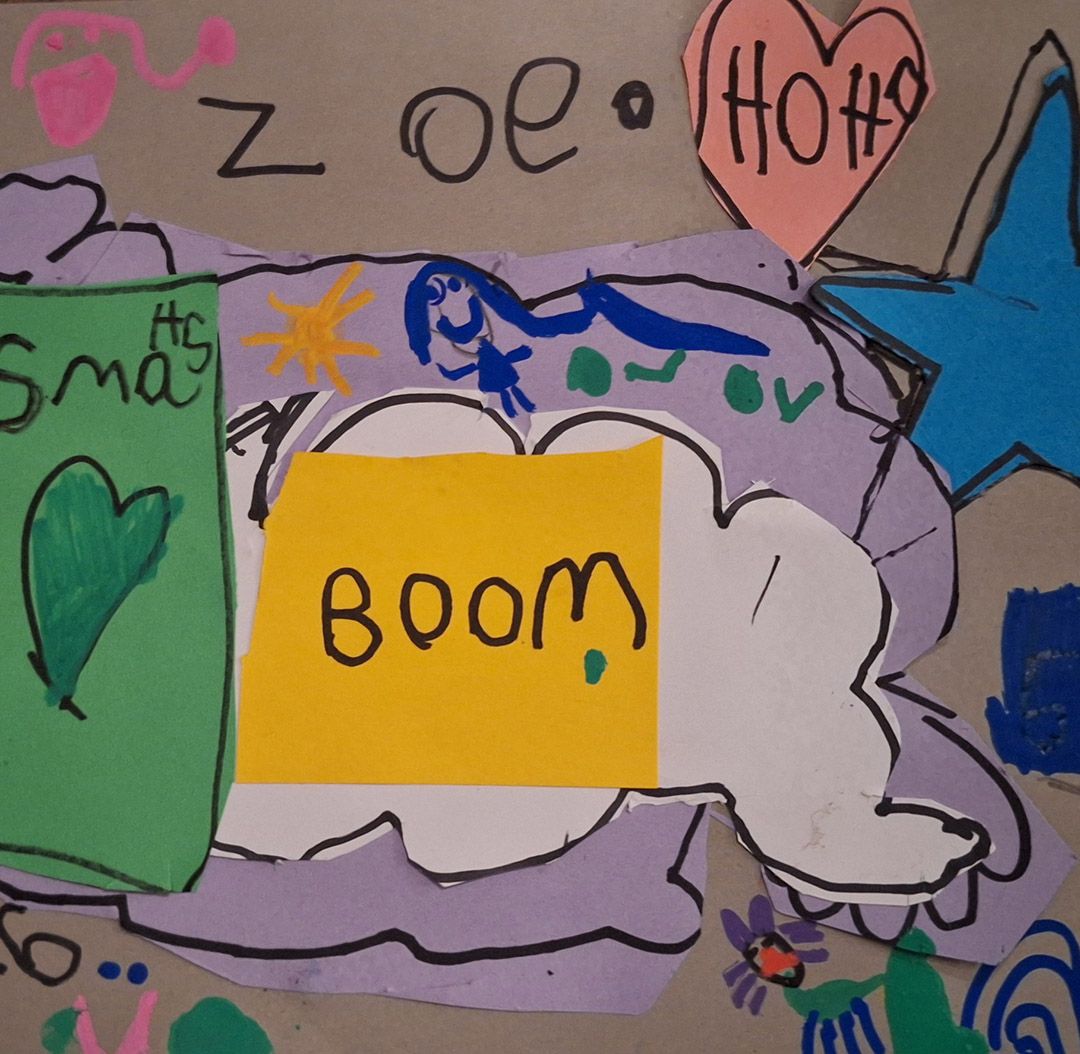 Child's pop art collage with bold marker drawings, words including "BOOM" and "Zoe", hearts, stars and coloured paper shapes.