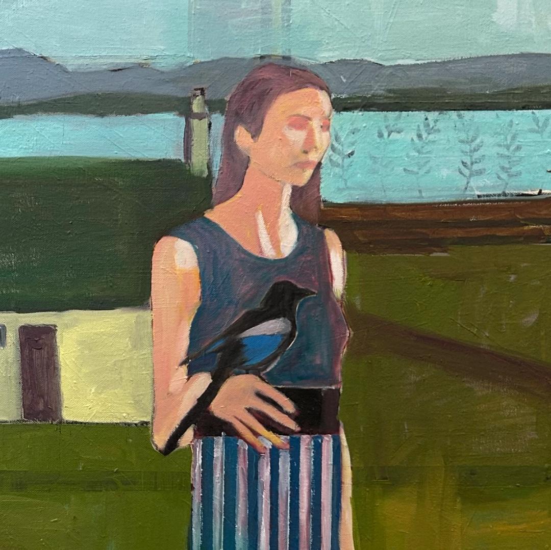 Oil painting on hand stretched canvas.A woman in a blue and white striped dress holding a bird stands in front of a cottage and lake with mountains in the background. The woman is thoughtful and appears confident. The narrative is open to interpretation however the colours of the landscape are warm and inviting suggesting a safe place. This painting is part of my present project on freedom.