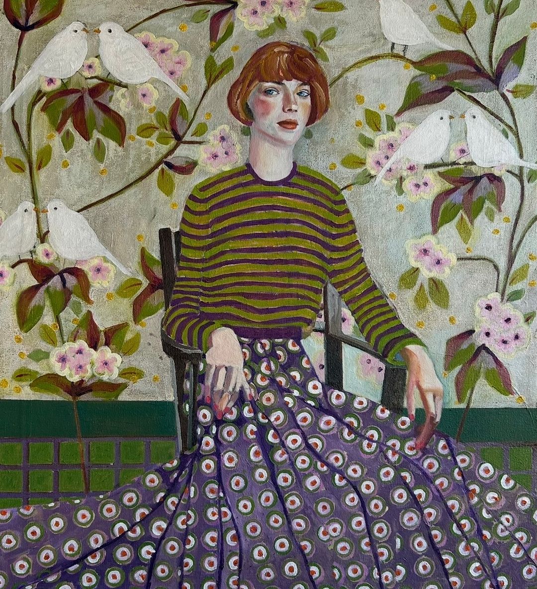 Painting of a seated red-haired woman in a striped jumper and patterned skirt, surrounded by white doves and blossom.