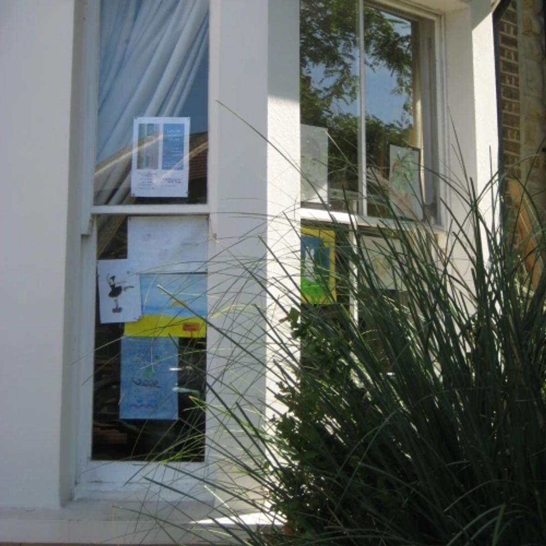 Picture of a window with drawings on it