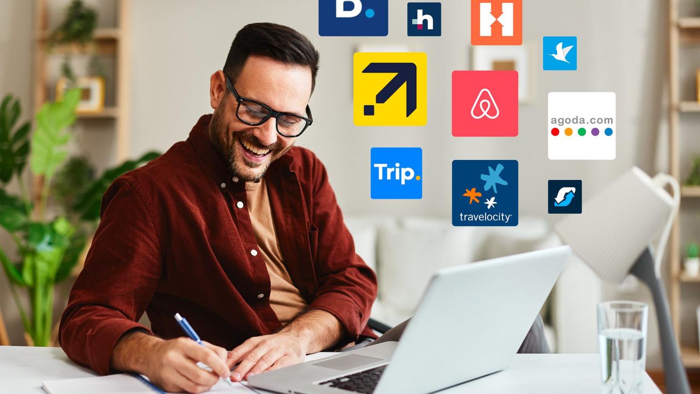 A man on a computer setting up a channel manager.