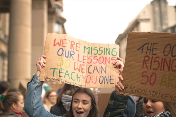 Group of people protesting with signs