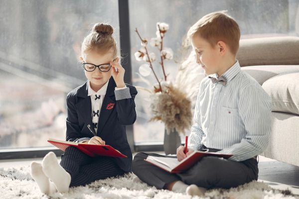 Two children studying together 