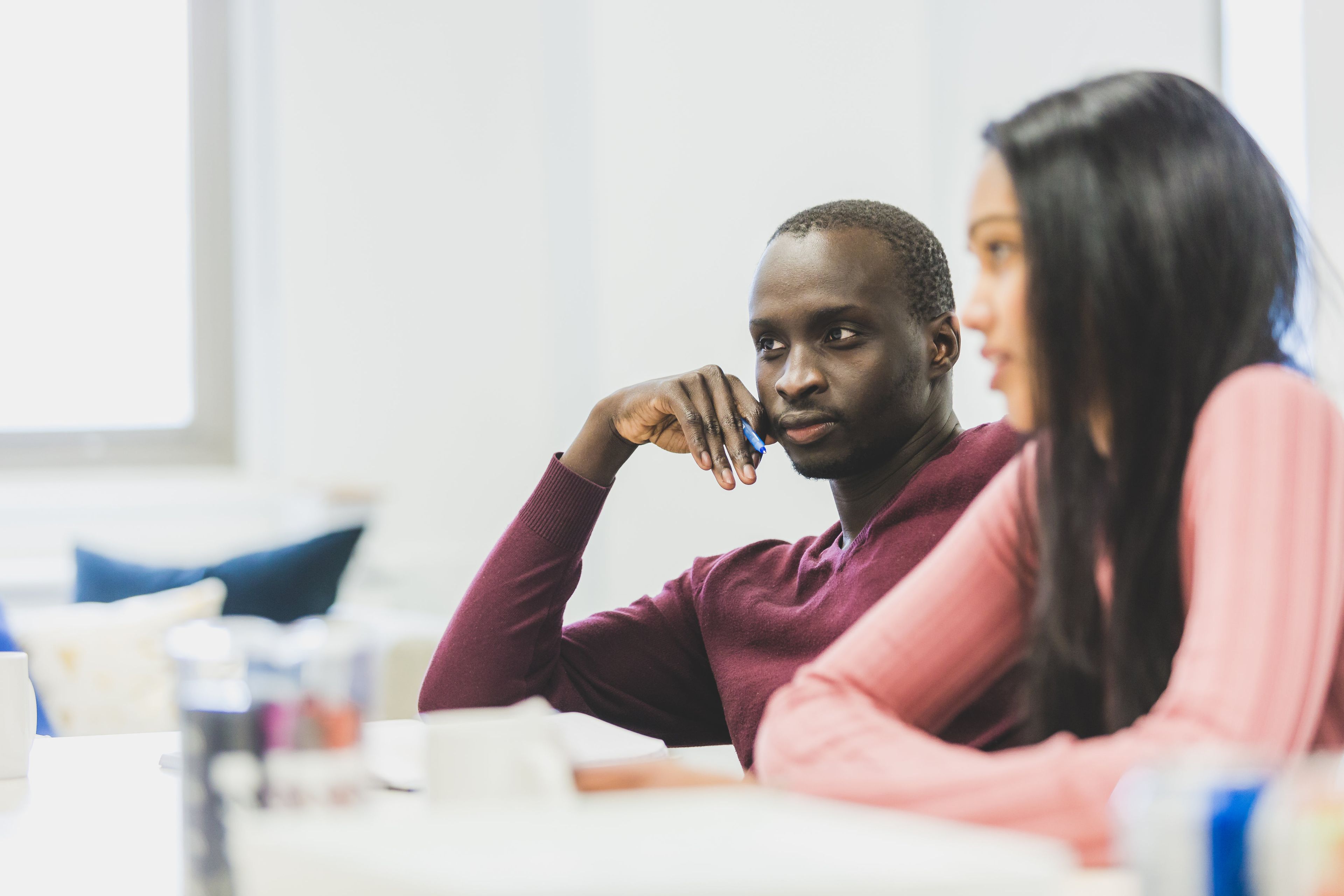 Staff in a Meeting listening to a manager