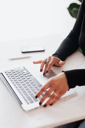 Laptop and plant on a desk