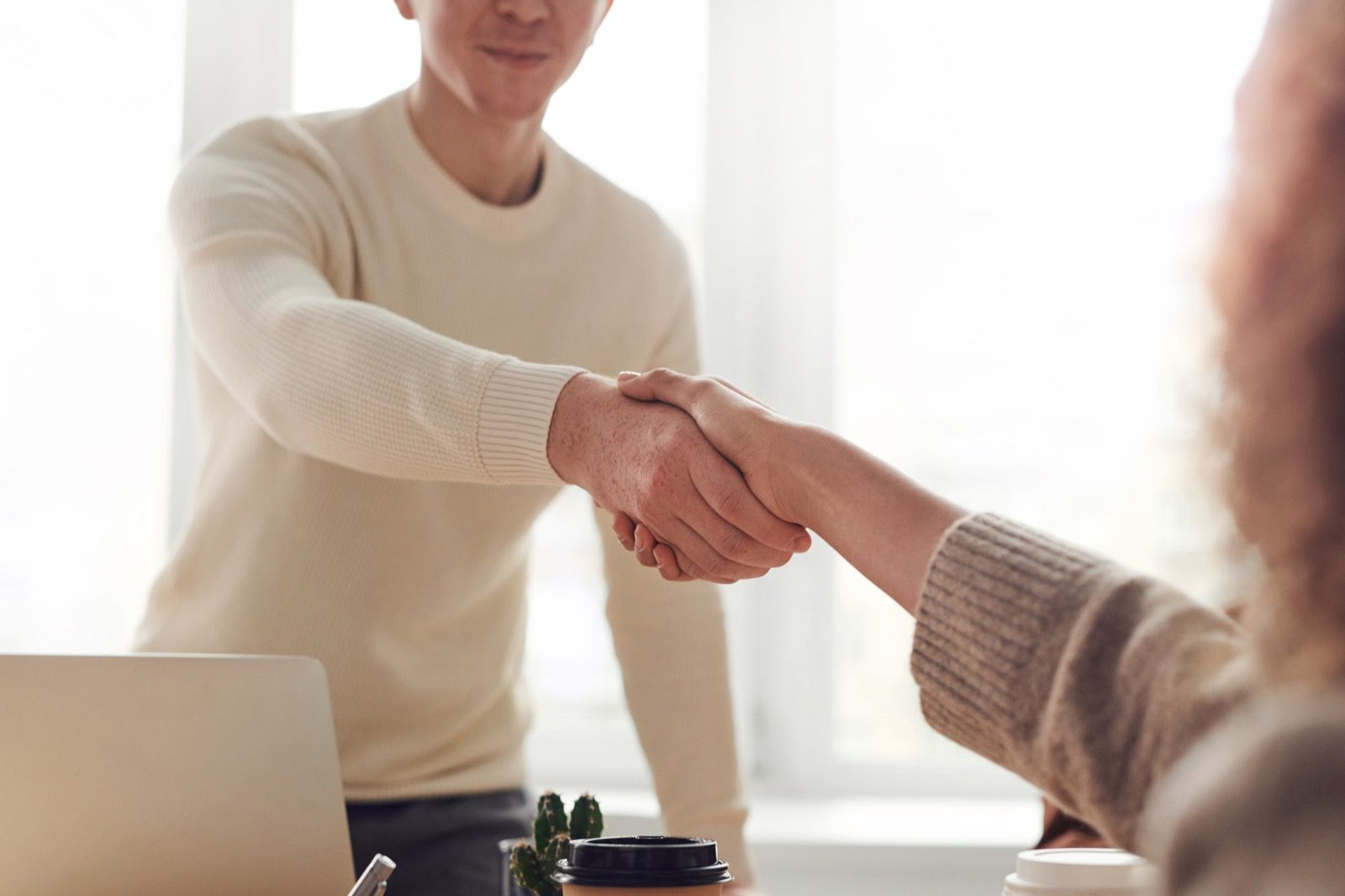 Two people shaking hands 