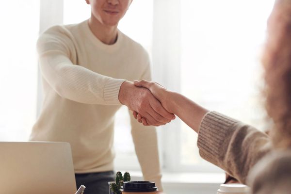 Two people shaking hands 