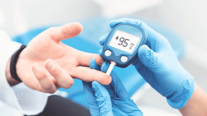 This image captures a healthcare professional measuring a patient's blood glucose level with a glucometer reading 95 mg/dL. The close-up highlights the importance of regular monitoring for effective diabetes management, aiding in maintaining optimal health and preventing complications. The scene emphasizes care and precision in health assessments.