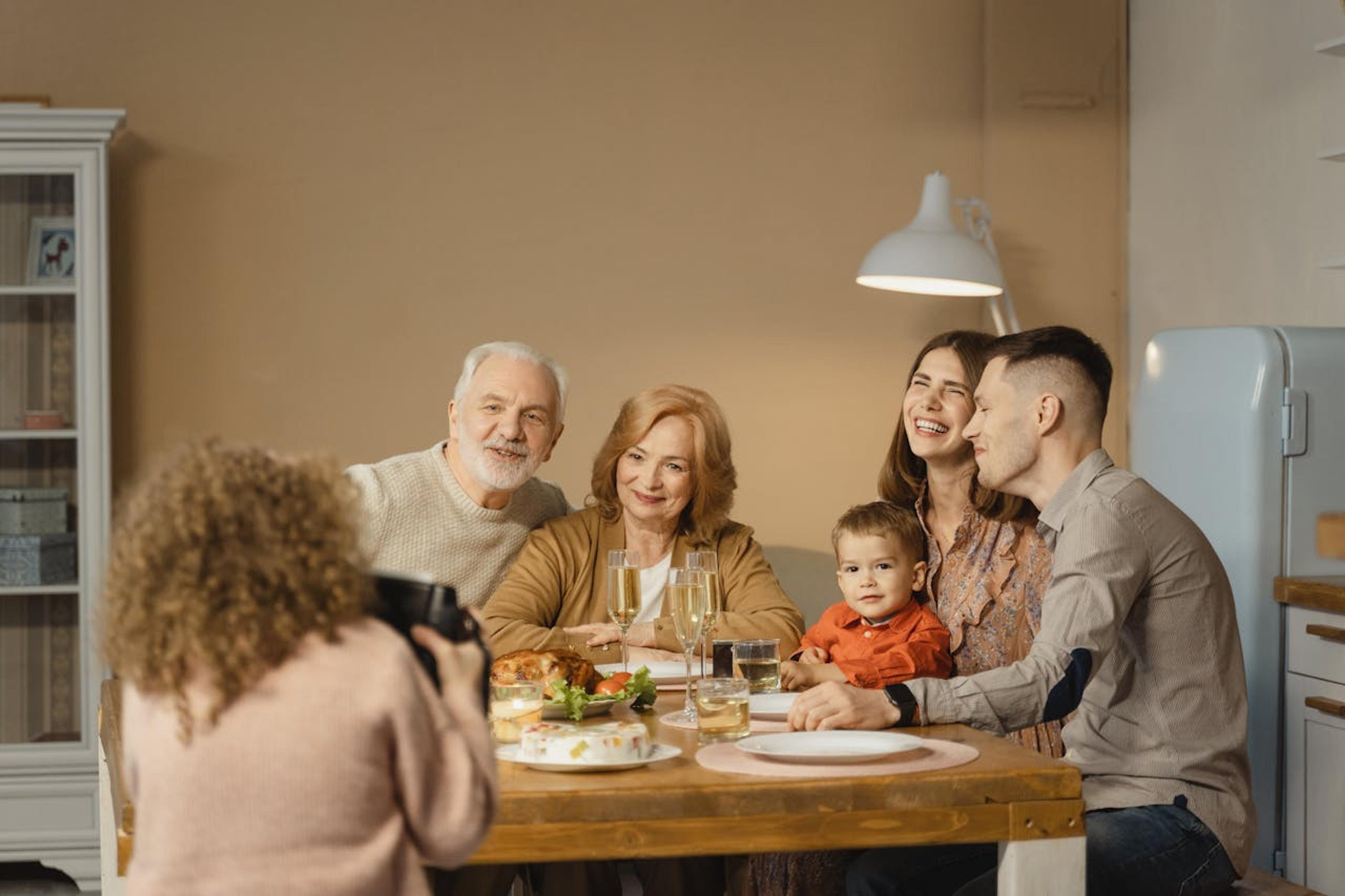 Three generations of a family at the dinner table